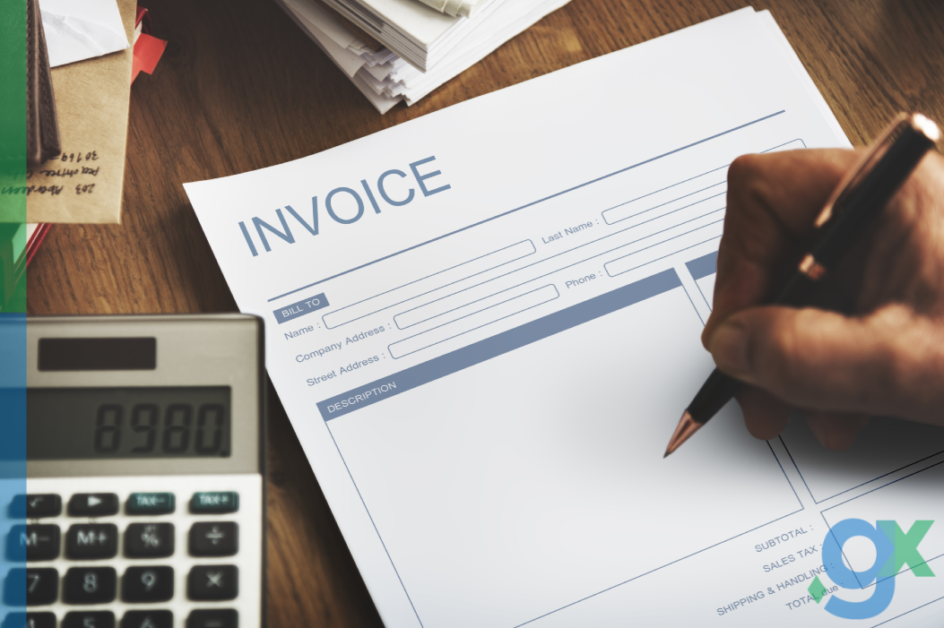 invoice with pen and paper