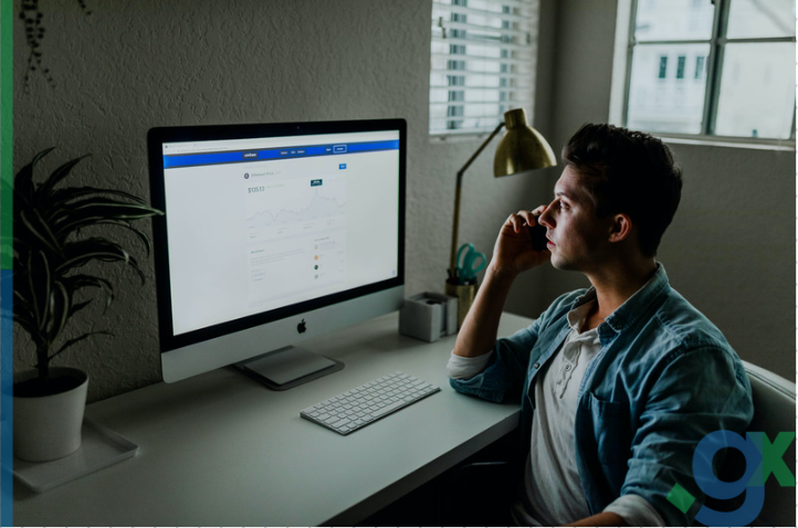 man looks at screen